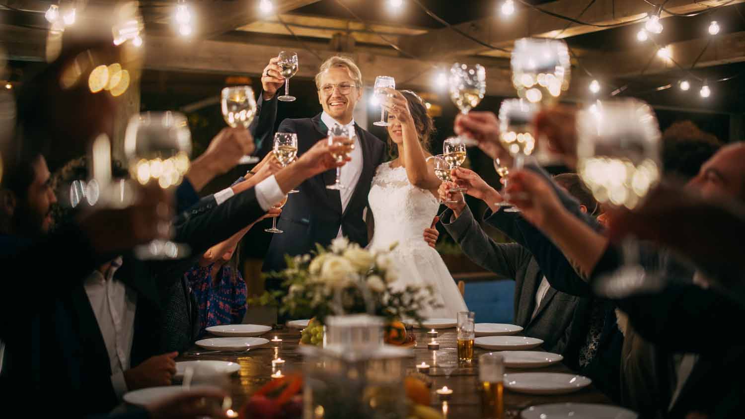 Beautiful,Bride,And,Groom,Celebrate,Wedding,At,An,Evening,Reception